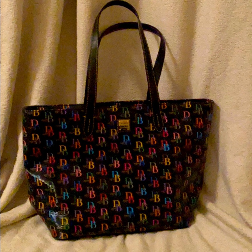 Dooney and Burke purse with mini detachable clutch